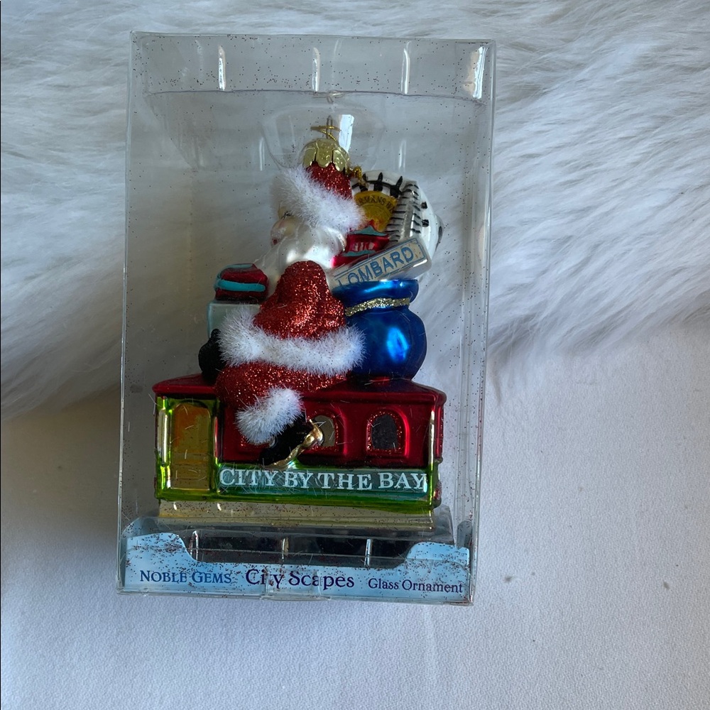 Kurt Adler Santa Sitting in San Francisco Trolley Glass Ornament. Brand New.